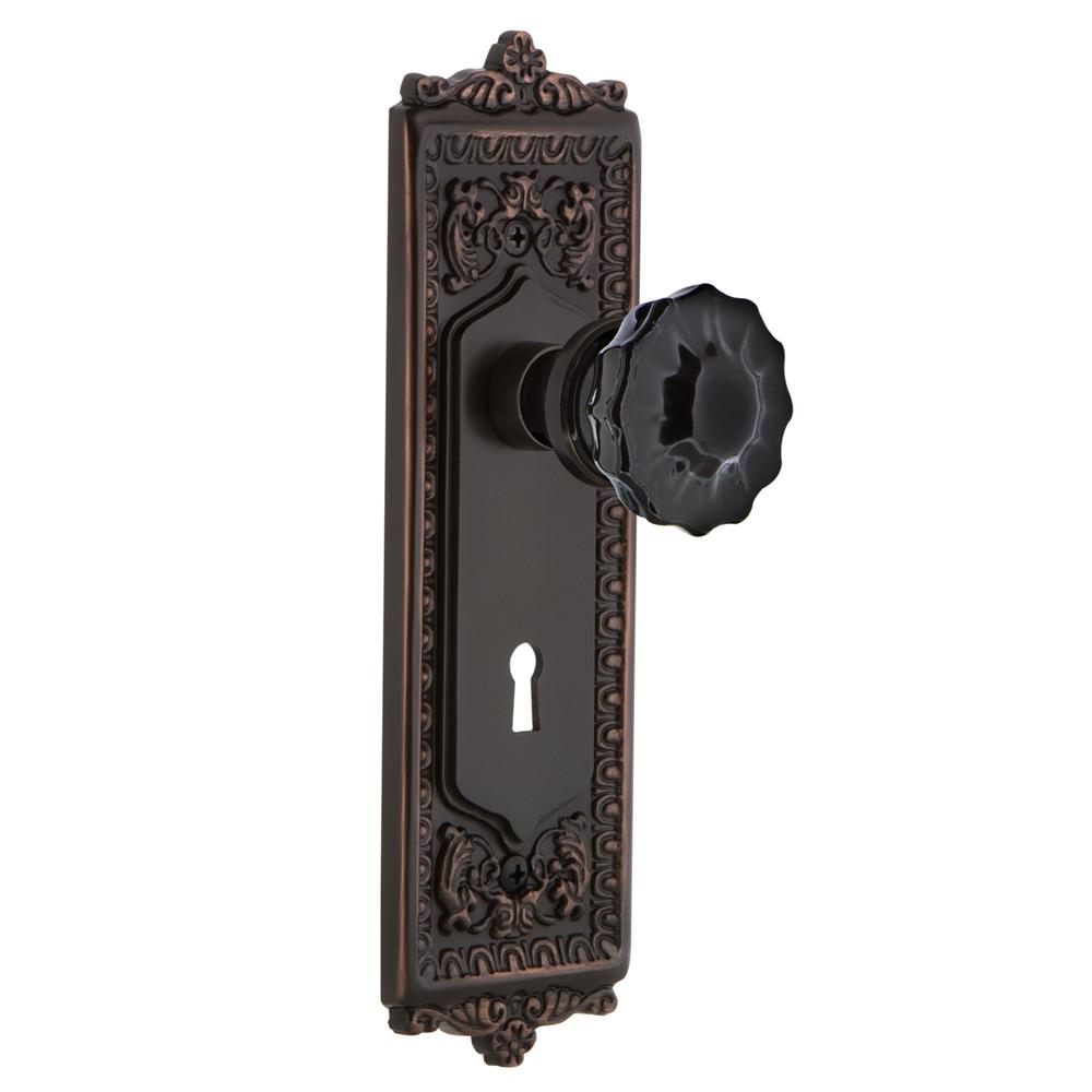 Nostalgic Warehouse EADCRB Colored Crystal Egg & Dart Plate with Keyhole Double Dummy Crystal Black Glass Door Knob in Timeless Bronze